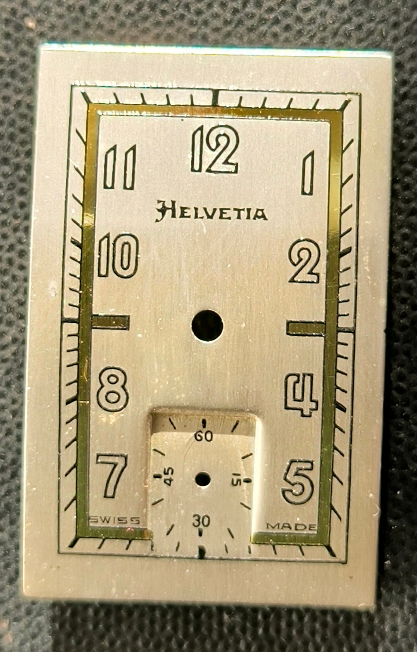 Helvetia Original - NOS - Art Deco Zifferblatt - L = 27,8mm X B = 17,9mm - für Helvetia Cal. 75 - 1930er Jahre