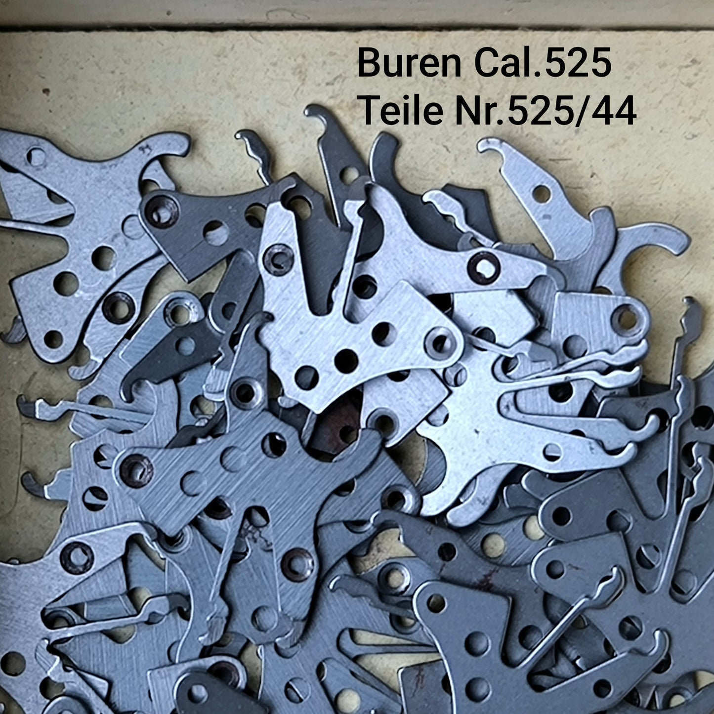 Buren Cal. 525 - Bumper - NOS - Buren Teile Nr. 44 - Winkelhebelfeder / Setting Lever Spring