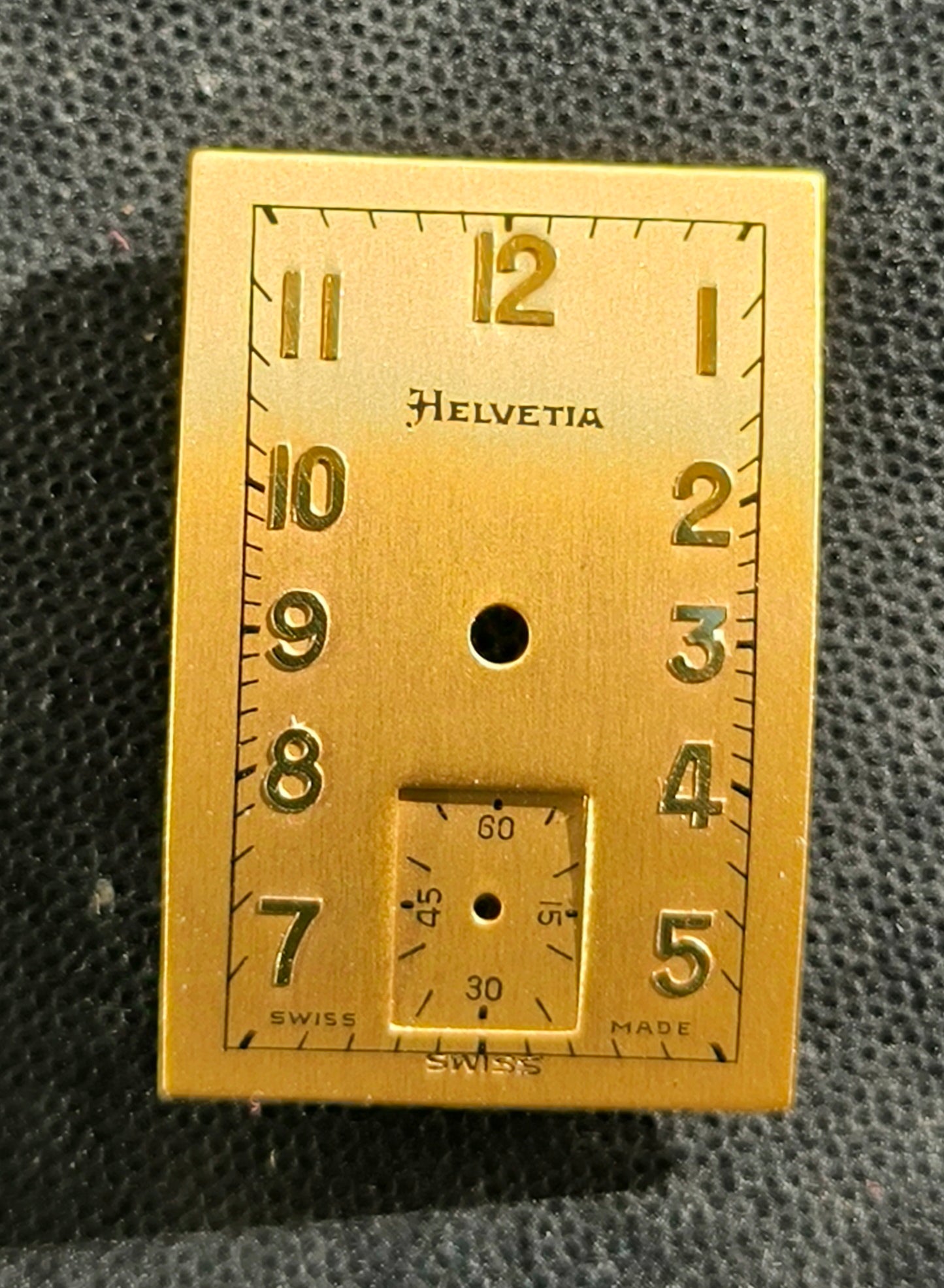 Helvetia Original - NOS - Art Deco Zifferblatt - L = 26,8mm X B = 18,1mm - für Helvetia Cal. 75 - 1930er Jahre